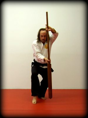 Michael practicing a form with the Eku